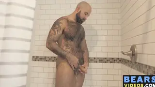 Inked Hairy Bear Pleasures Himself With Slow Spanking