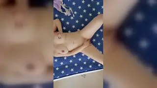 Japanese MILF Fingers Herself to Orgasm on Bed