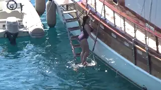 Busty Tourist Flaunts Her Curves on a Sunlit Getaway