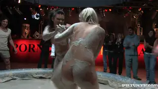 Blonde and Brunette Wrestle Naked in Vintage Mud