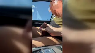 Latino Daddy Rides a Toy on the Car Hood Outdoors