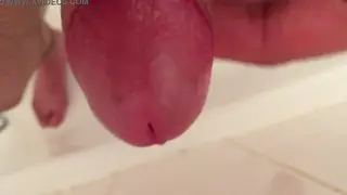 Solo Guy Strokes to a Cumshot in the Shower