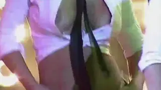 Latina Beauty Teases in a Slow Striptease