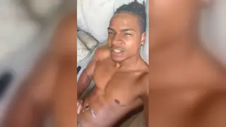 Black Stud Strokes Hard Cock on Couch