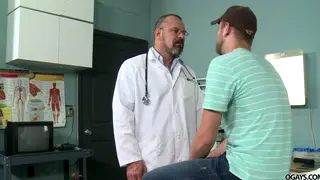 Mature Doctor Rides Patient in Hospital Room