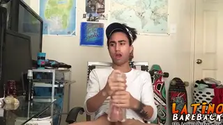 Inked Latino Twink Strokes His Thick Cock With a Toy