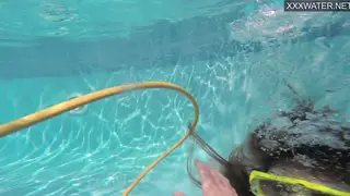 Petite European Brunette Glides Naked Underwater