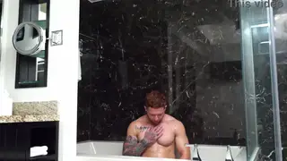 Muscular Jock Takes Fist and Cock in Shower