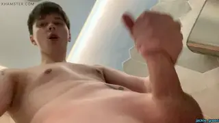 European Twink Strokes Uncut Cock in Public Restroom