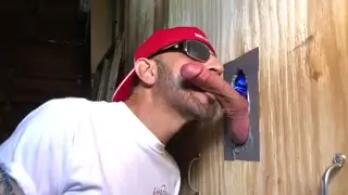 Muscular Stranger Services a Hung Hunk Through a Gloryhole