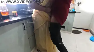 Uniformed Maid Jerks a Cock in the Kitchen