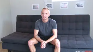 Blonde Tattooed Jock Strokes His Big Cock on the Casting Couch