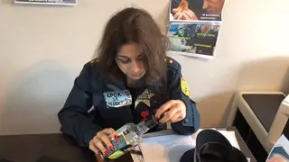 European Brunette Services Inspector on Office Desk