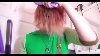 Woman Brushes and Straightens Damp Hair Solo