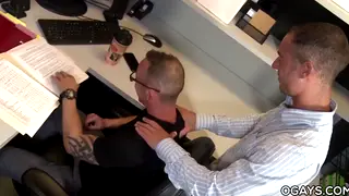 Mature Hairy Colleague Delivers Deep Oral at Office Desk