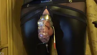 Chastity Cage Milking Delivers Hands-Free Cumshot