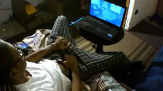 Black Teen Strokes His Length While Watching Porn