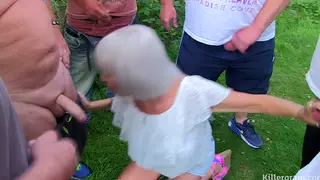 Mature GILF Surrounded by Cocks Outdoors
