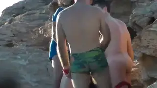 Latino Daddy Leads Muscular Gangbang on Sandy Beach