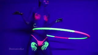 Petite Redhead Dances and Hula Hoops Nude Under Black Light