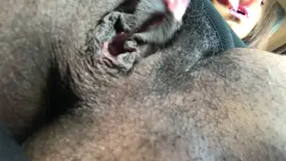 Ebony Babe Pleasures Hairy Pussy in Car Park