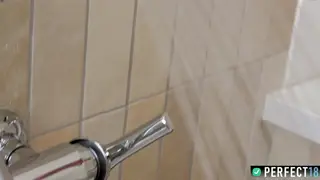 Busty Tattooed Woman Masturbates in a Wet Shower
