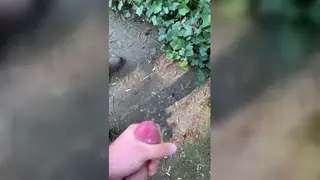 Guy Strokes Big Cock Outdoors Until He Cums