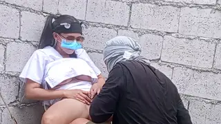 Asian Nurse Services Handyman Outdoors at Abandoned Hospital