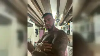 Muscular Latino Daddy Flexes and Strokes in Office Uniform