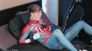 Muscular Twink Bound in Latex Takes Toy and Handjob