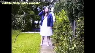 Brunette Lesbian Pisses Outdoors in Stockings and Lingerie