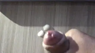 Overhead Angle Captures Solo Handjob Ending in Cumshot