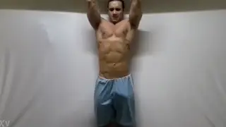 Handsome Guy Strokes His Hard Cock While Exercising