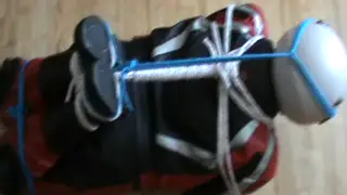 European Pair Engages in Leather Bondage Session
