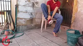 Two Men Share a Quick Outdoor Encounter