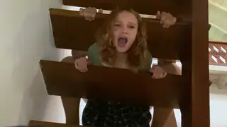Redhead in Stockings Takes It Doggystyle on the Stairs