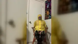 Raincoat Bondage Session Escalates Into Dominant Play