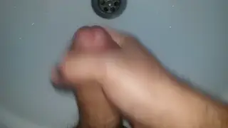 Solo Guy Strokes to a Heavy Cumshot in the Bathroom