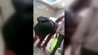 Mature Man Receives Blowjob in Public Bathroom