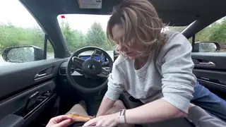 Blonde MILF Delivers Steamy Car Handjob in Public