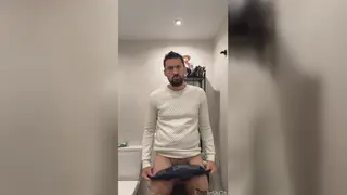 Hairy Latino Daddy Strokes His Thick Cock in Public Restroom