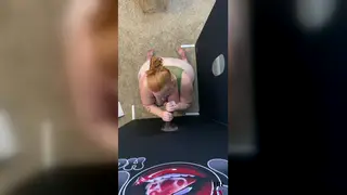 Voluptuous Redhead Takes a Stranger's Load at the Gloryhole
