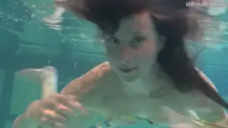 Petite European Brunette Pisses in Pool Lingerie