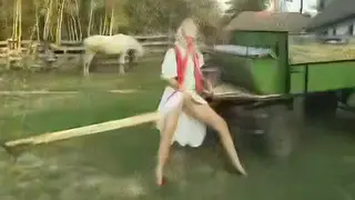 Blonde Farmhand Handles Two Cocks in an Outdoor Double Penetration