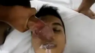 Asian Amateur Takes a Warm Facial in Close-Up