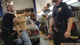 Three Men Share an Intense Encounter in Uniform
