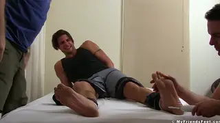 Muscular Guy Endures Intense Foot Tickling Session