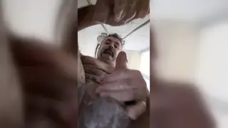 Mature Latino Strokes His Cock in the Shower