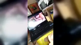 Horny Guy Jerks Off While Watching Porn on His Screen