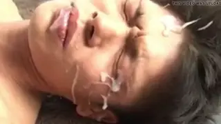 Twink Slave Drenched in Bukkake Facials at Orgy